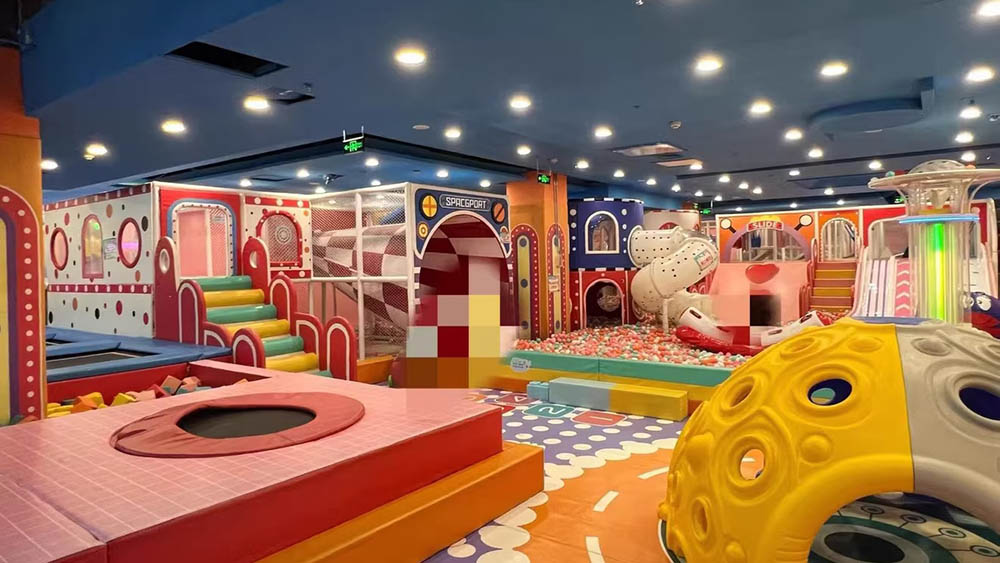 Multi-functional indoor playground equipment with diverse play areas

